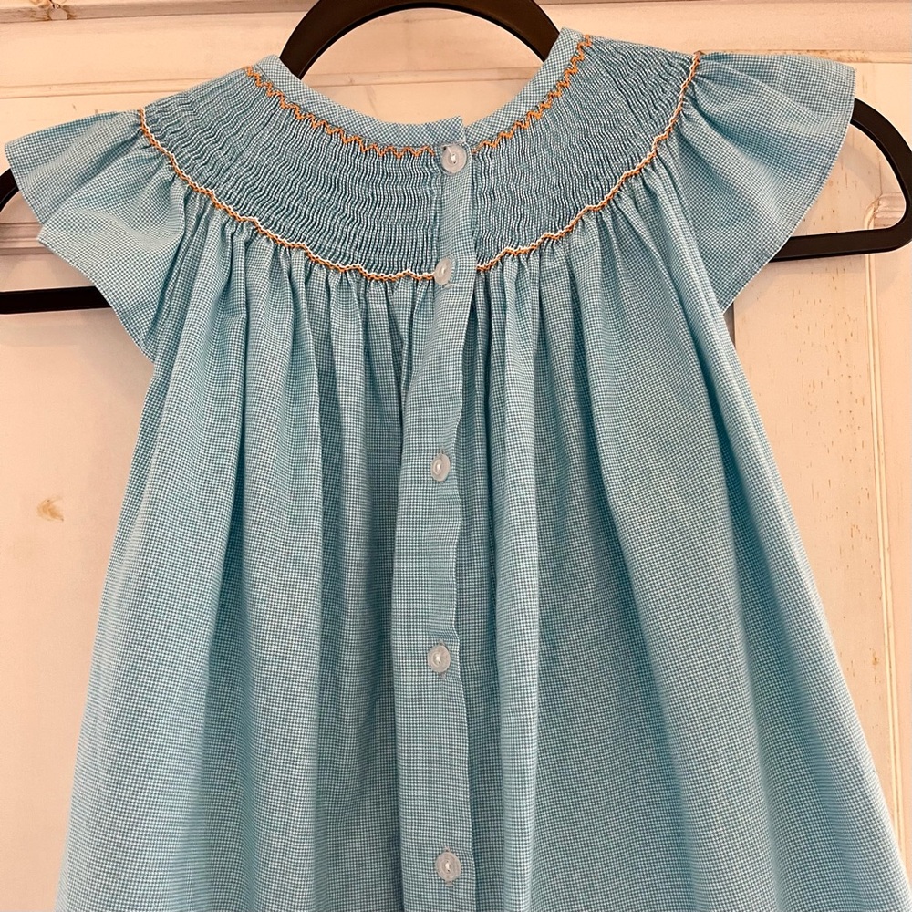Castles & Crowns Smocked Dress Size 7
w/yellow fish
Aqua Blue Plaid Cap Sleeves - Picture 3 of 7
